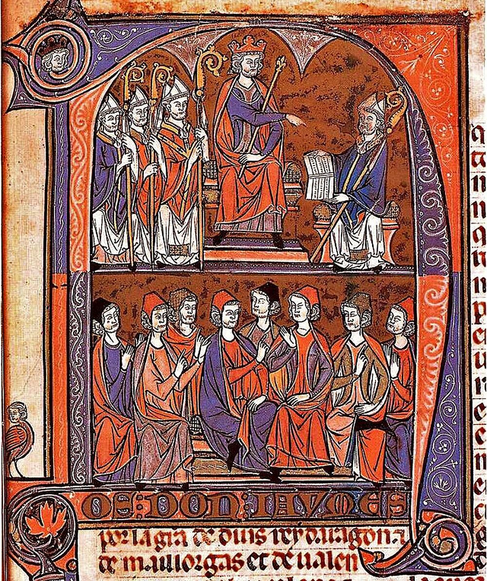 Texto en el que se representa al Rey Jaime I de Aragón recibiendo del obispo y jurista Vidal de Canellas los Fueros de Aragón ante otros varios magnates eclesiásticos. 